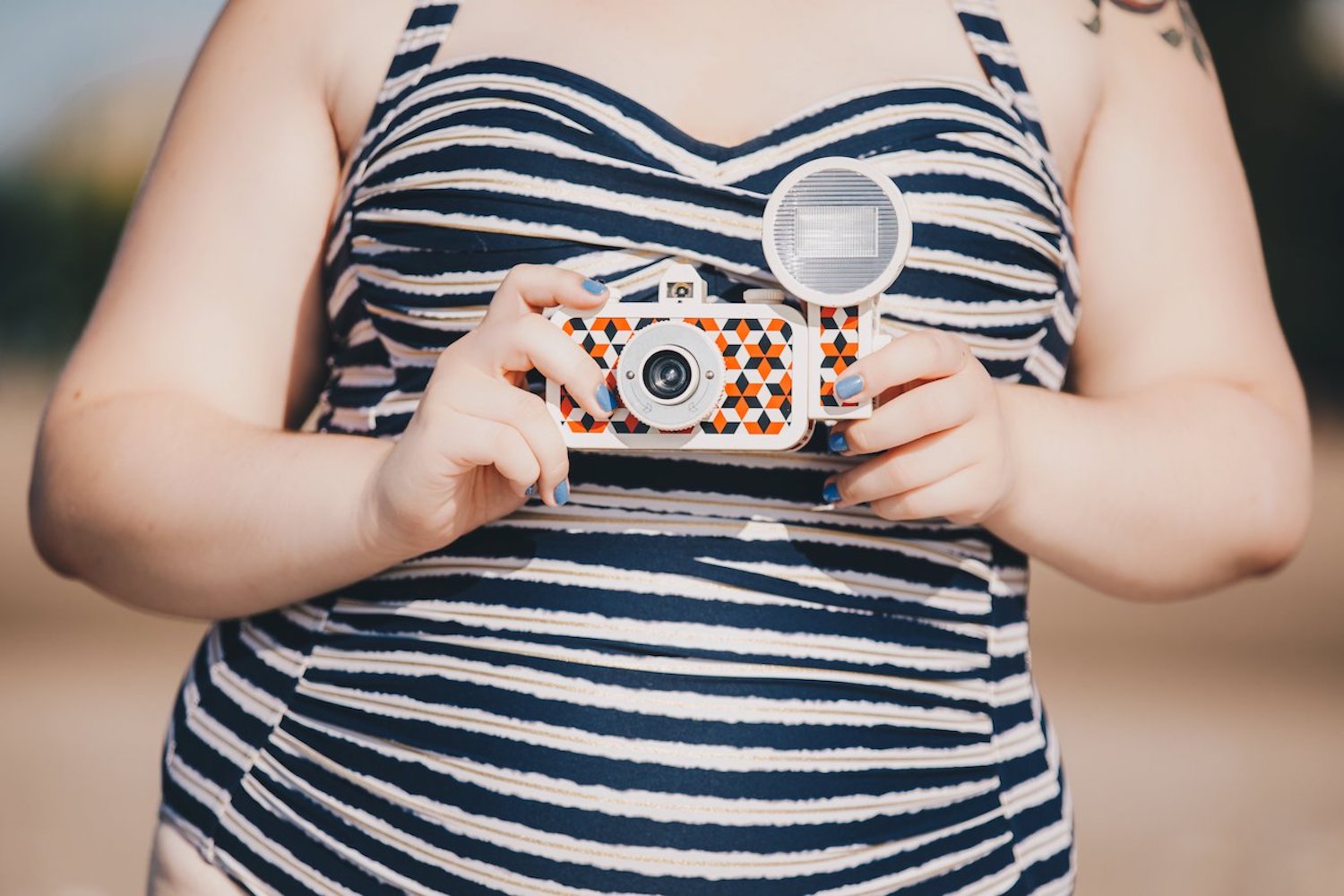 A woman on holiday taking a photo