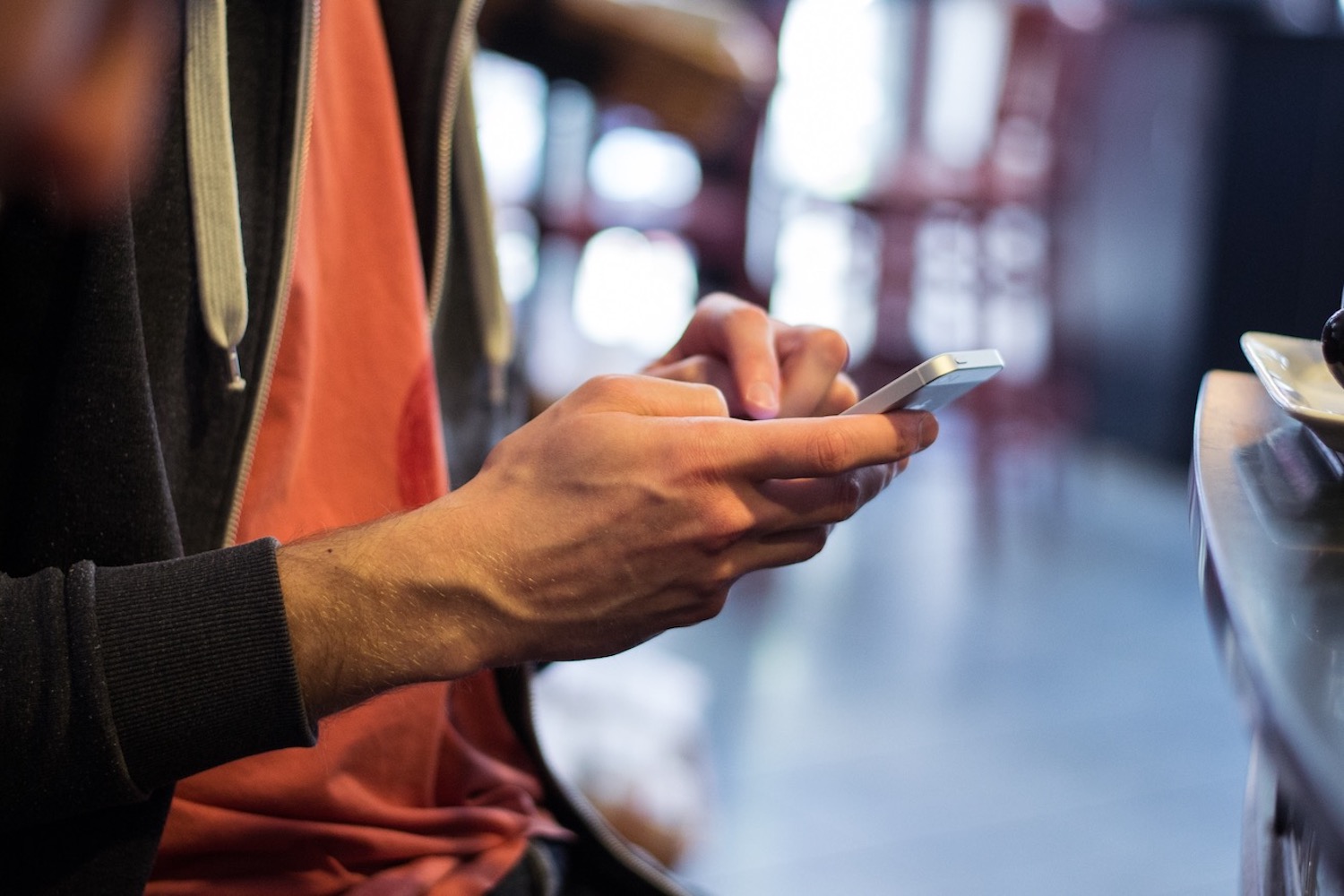 A man looking at his mobile phone