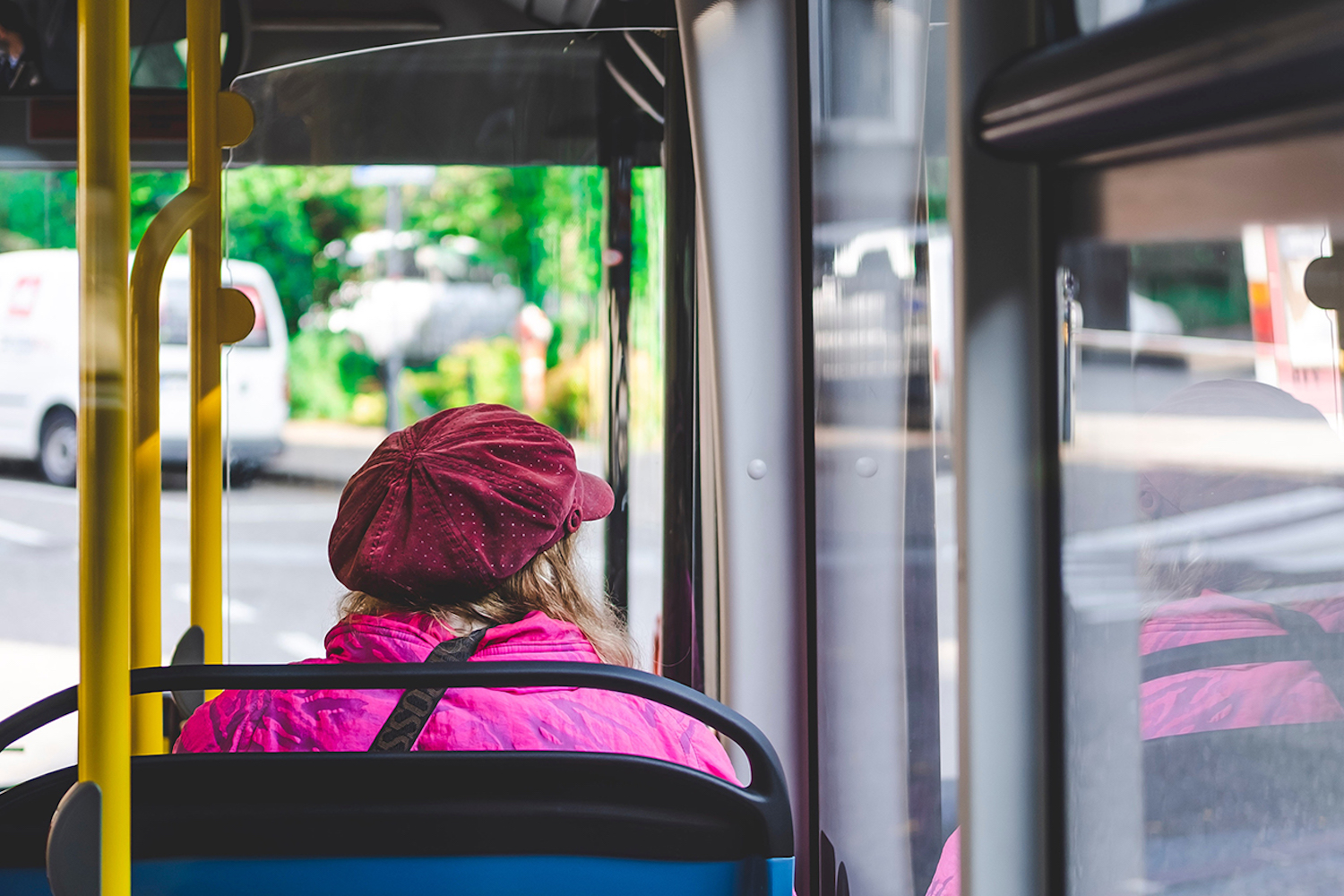 A woman sitting on a bus