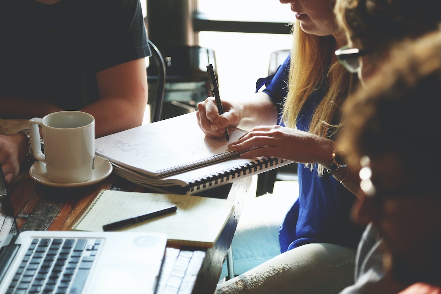 A small group of people in a meeting