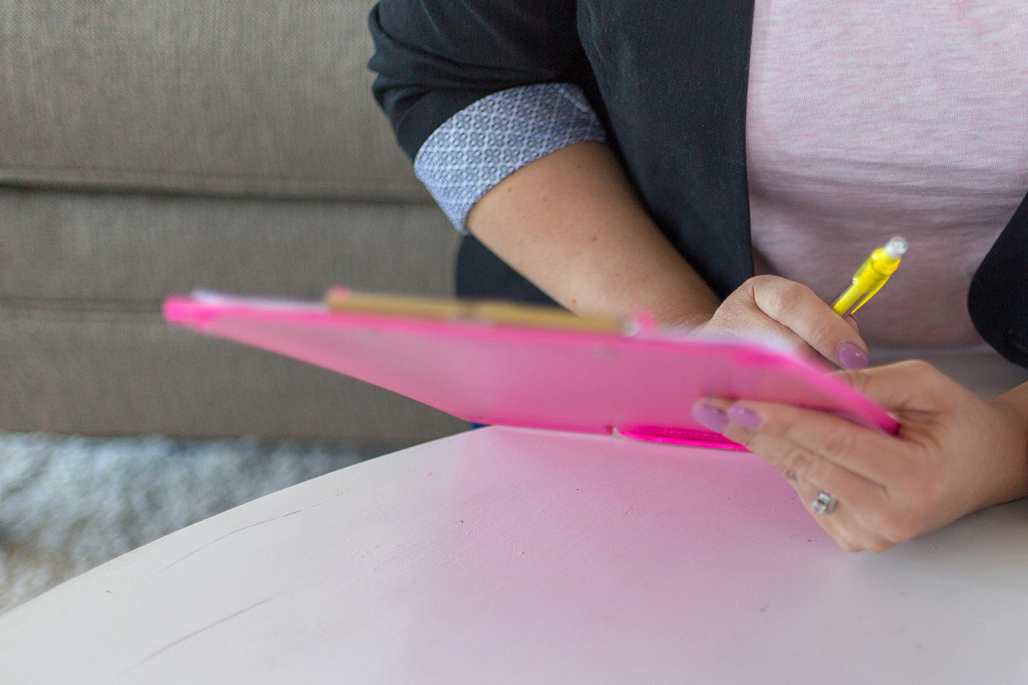 A woman with a clipboard