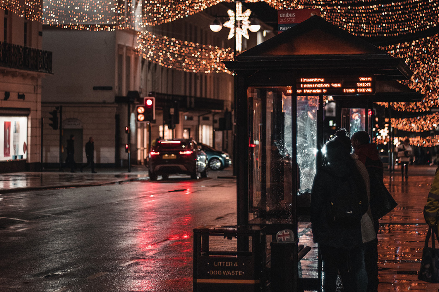 A bus stop at night
