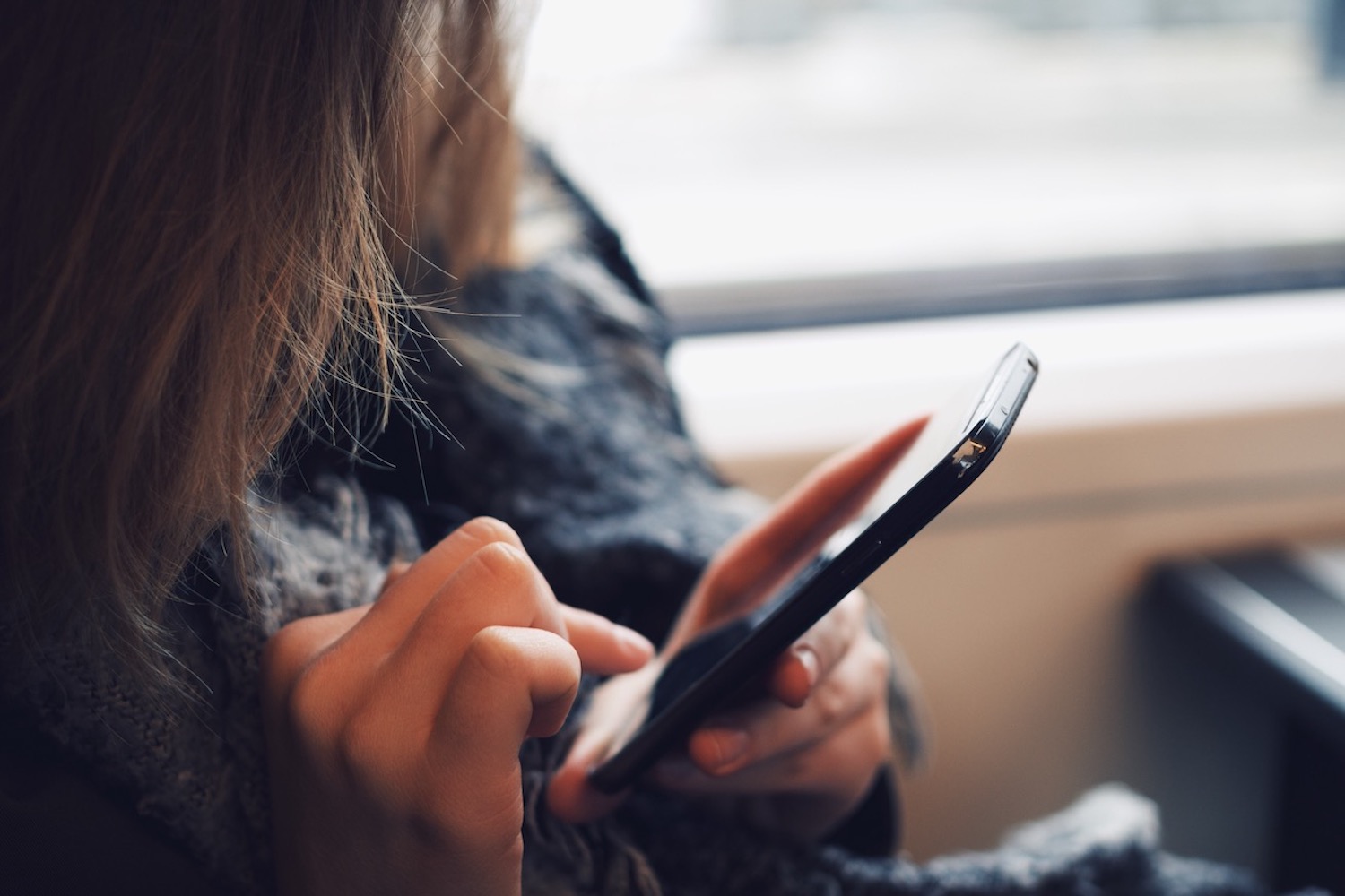 A woman using her mobile phone