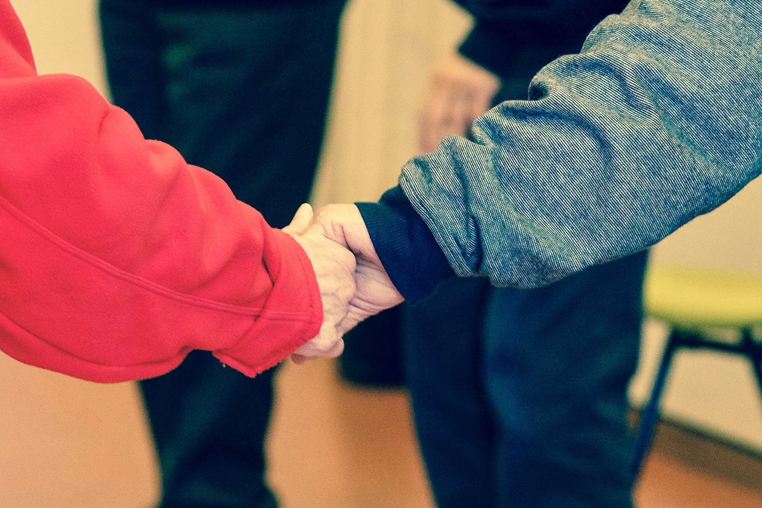 A man and woman holding hands